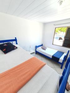 Lova arba lovos apgyvendinimo įstaigoje Casa incrível a Beira Mar! 3 qtos Ponta do Papagaio