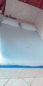 a view of the bottom of a bed in a tent at Miru´s motel in Rio Verde
