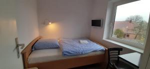 Postel nebo postele na pokoji v ubytování Schillers Landhaus