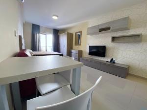 TV a/nebo společenská místnost v ubytování Cast Apartments