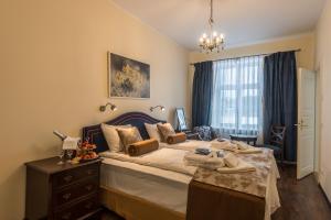 Posteľ alebo postele v izbe v ubytovaní Kernu Manor Hotel & SPA