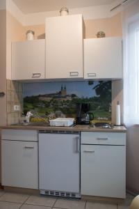 Η κουζίνα ή μικρή κουζίνα στο ruhig gelegenes 1 Zimmer Appartment