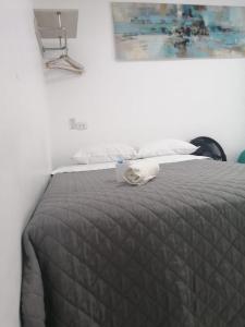 Postel nebo postele na pokoji v ubytování Suite Trujillo