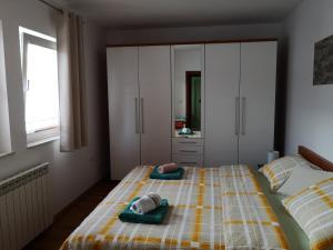 Postel nebo postele na pokoji v ubytování Apartment Igor - HOLIDAY HOME