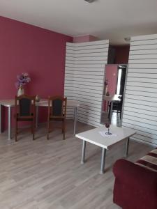 Predel za sedenje v nastanitvi apartman