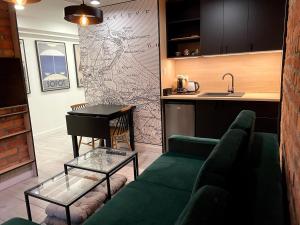 Kuchyňa alebo kuchynka v ubytovaní Apartament2 Tri-City Oliwa Ogród, prywatne wejście