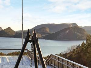 a pair of skis sitting on top of a deck at 8 person holiday home in Sundlandet in Snildal