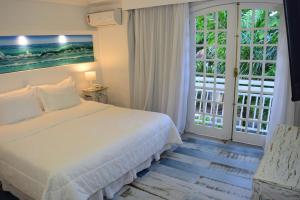 Postel nebo postele na pokoji v ubytování Auberge de la Langouste