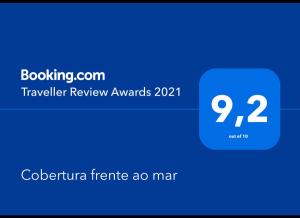 a screenshot of a cell phone with the text traveler renew awards at Cobertura frente ao mar in Florianópolis