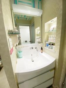 Un baño de CURE