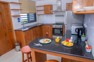 Nhà bếp/bếp nhỏ tại Kolibri Holiday Apartments