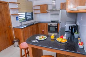 Kuchyň nebo kuchyňský kout v ubytování Kolibri Holiday Apartments