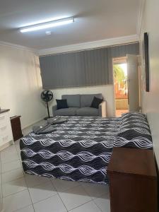 
A bed or beds in a room at Cityside Accommodation
