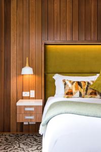 Letto o letti in una camera di Rainforest Deluxe