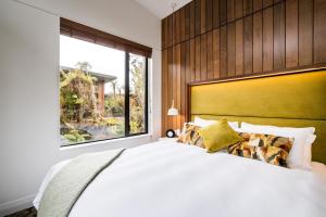Letto o letti in una camera di Rainforest Deluxe
