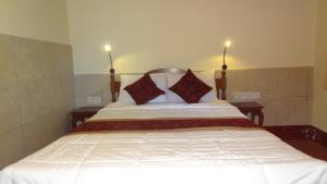 Llit o llits en una habitació de Sunarta House Homestay