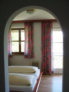 Postel nebo postele na pokoji v ubytování Haus Edith