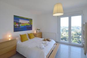 Ένα ή περισσότερα κρεβάτια σε δωμάτιο στο VILLA SANT RAMON - REF 043