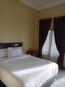 Kaesa Homestay客房内的一张或多张床位