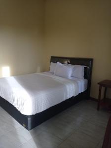 Kaesa Homestay客房内的一张或多张床位