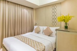 Ліжко або ліжка в номері Hotel Pravo Hong Kong