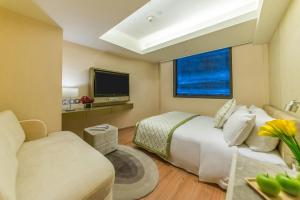 Телевізор і / або розважальний центр в Hotel Pravo Hong Kong