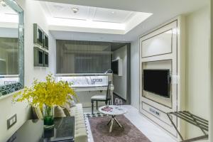 Телевізор і / або розважальний центр в Hotel Pravo Hong Kong