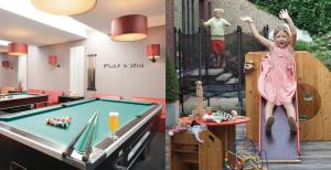 a little girl playing pool in a play room at Residentie Alfa Inn*** in Blankenberge