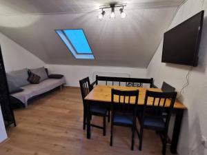 Telewizja i/lub zestaw kina domowego w obiekcie Linz LIVIA