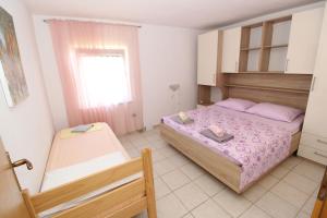 Postel nebo postele na pokoji v ubytování Apartment Marija