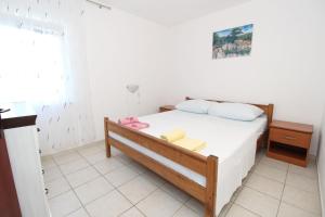 Postel nebo postele na pokoji v ubytování Apartment Marija