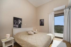 Łóżko lub łóżka w pokoju w obiekcie Sunny Summer House 4*