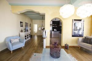 A seating area at 026 Villa Leonor - Deniasol