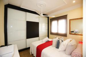 A bed or beds in a room at 026 Villa Leonor - Deniasol
