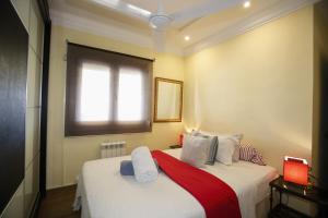 A bed or beds in a room at 026 Villa Leonor - Deniasol