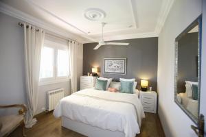 A bed or beds in a room at 026 Villa Leonor - Deniasol