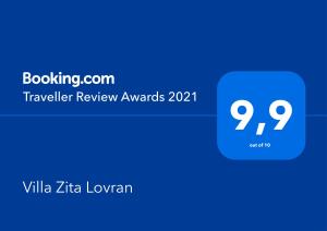 eine blaue Box mit den Auszeichnungen für die Textreisenden-Bewertung in der Unterkunft Villa Zita Lovran in Opric