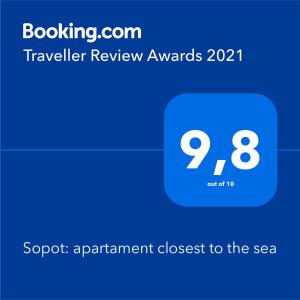 a blue box with the wordsraveler review awards on it at Sopot: apartament closest to the sea in Sopot