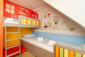 Posteľ alebo postele v izbe v ubytovaní Kolping Family Resort