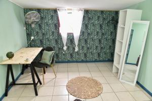 Ảnh trong thư viện ảnh của La Maison des Oeillets Aéroport Roland Garros ở Sainte-Marie