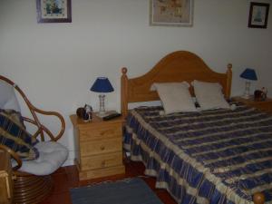 Ліжко або ліжка в номері Apartamentos Varandas da Rocha
