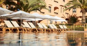 בריכת השחייה שנמצאת ב-Insotel Club Tarida Playa או באזור