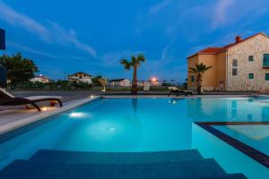 Bazén v ubytování Resort Mirakul nebo v jeho okolí