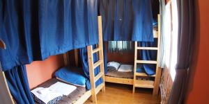 Palanda nebo palandy na pokoji v ubytování Bellscabin Guesthouse