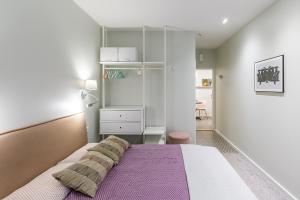Postel nebo postele na pokoji v ubytování Art & Comfort Rooms