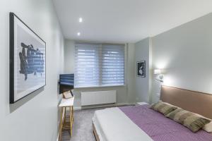 Postel nebo postele na pokoji v ubytování Art & Comfort Rooms