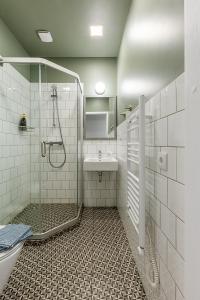 Koupelna v ubytování Art & Comfort Rooms