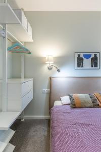 Postel nebo postele na pokoji v ubytování Art & Comfort Rooms