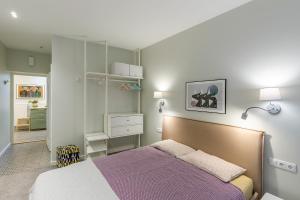 Postel nebo postele na pokoji v ubytování Art & Comfort Rooms