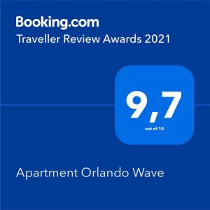 Et logo, certifikat, skilt eller en pris der bliver vist frem på Apartment Orlando Wave